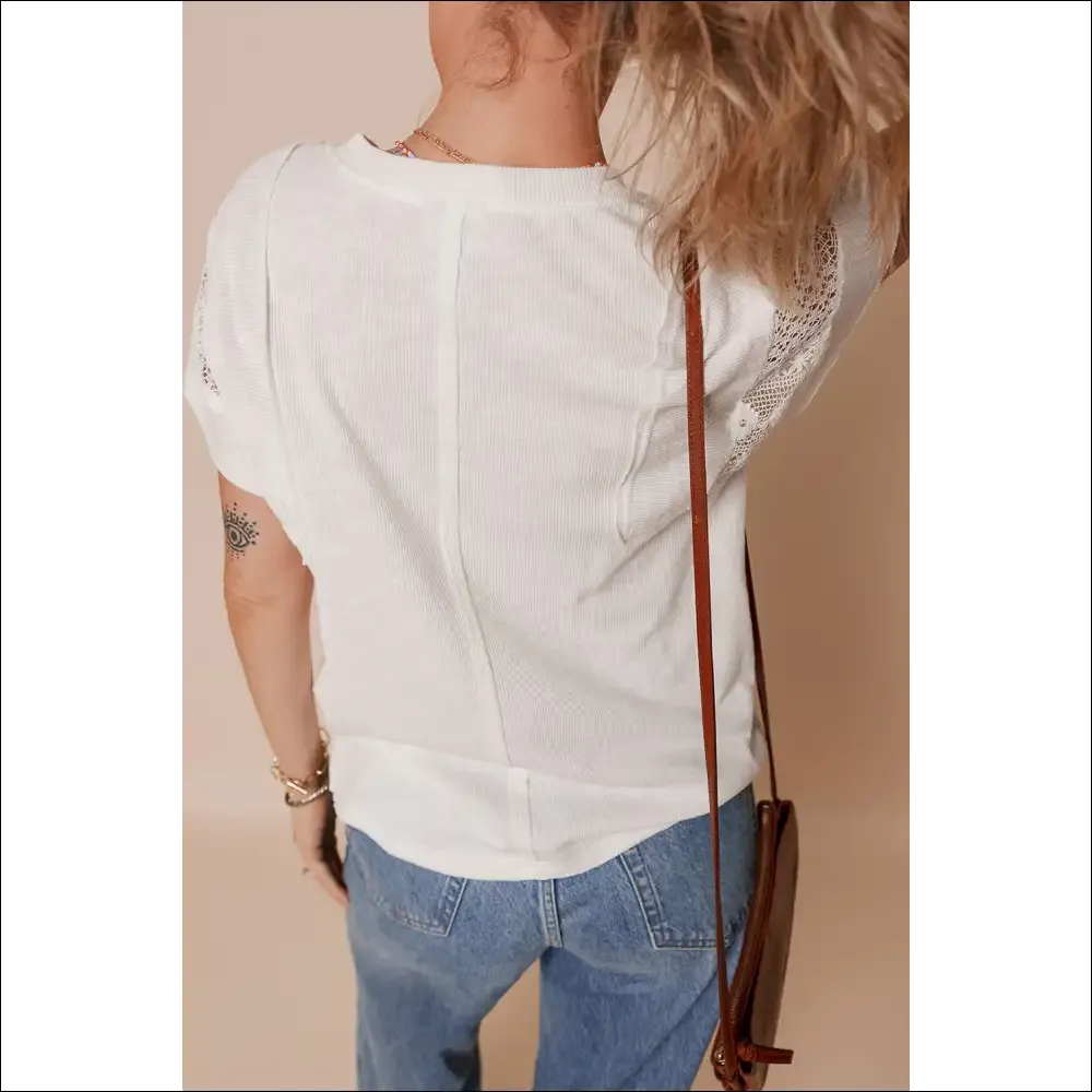 Chic White Ribbed Lace Top with Knot Detail