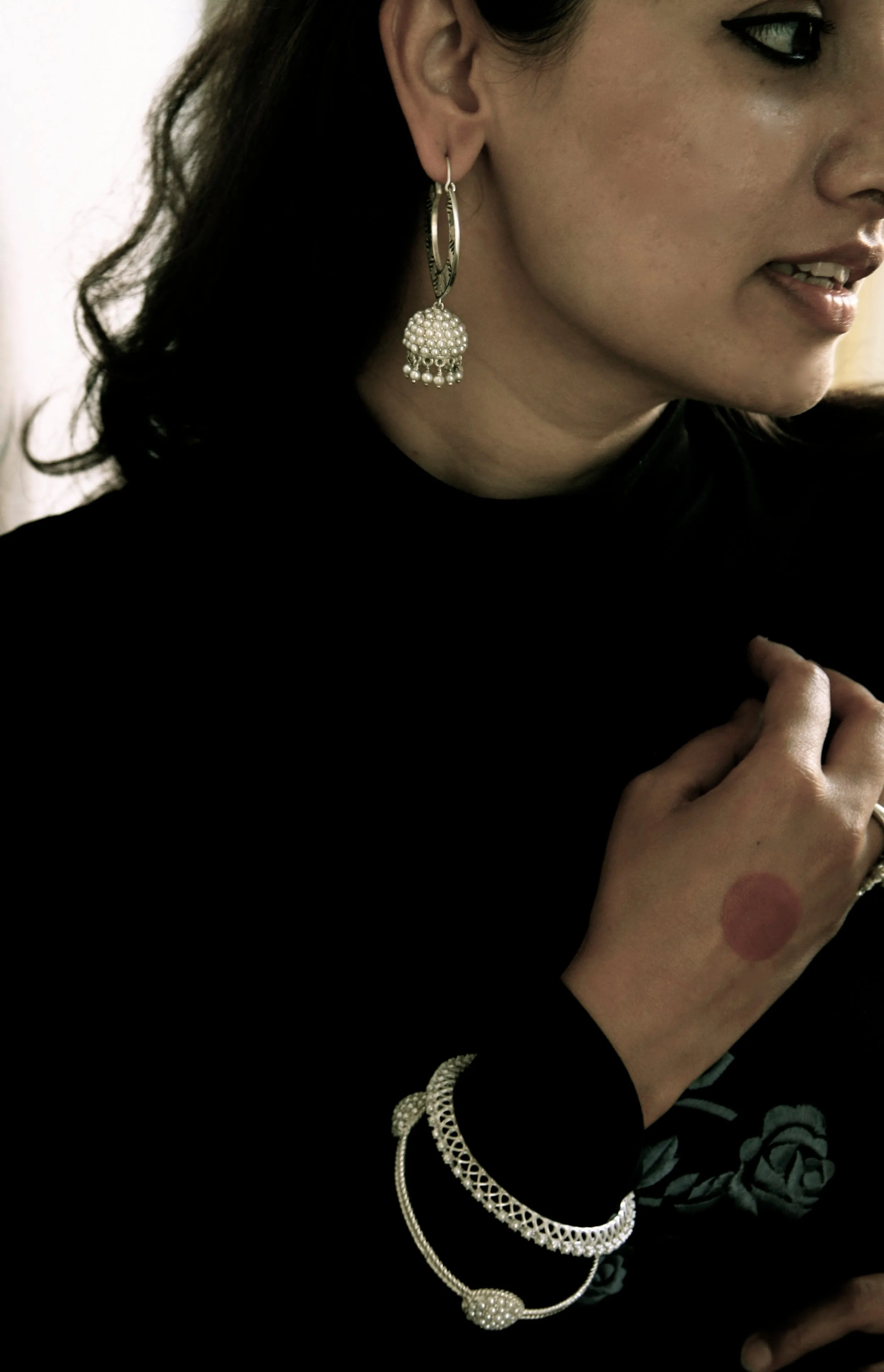 Classic and timeless, pearl encrusted statement bangle