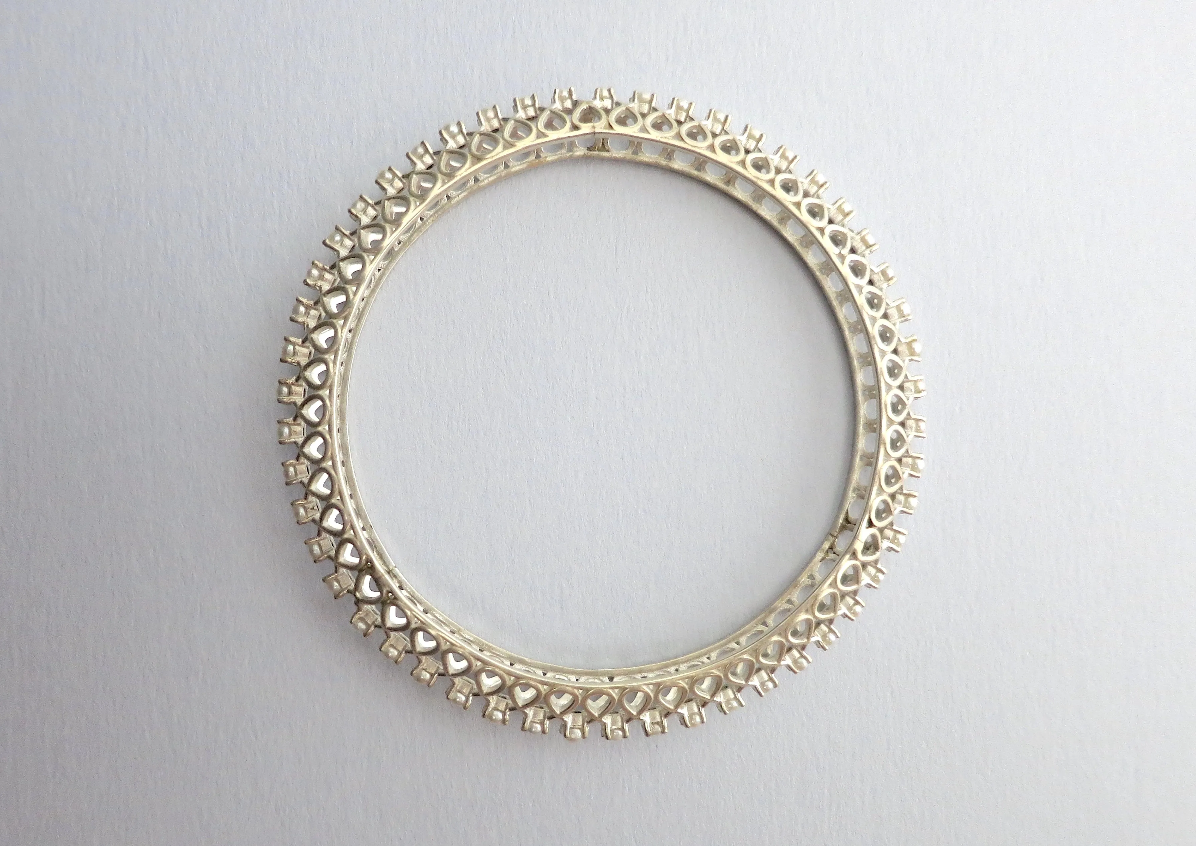 Classic and timeless, pearl encrusted statement bangle
