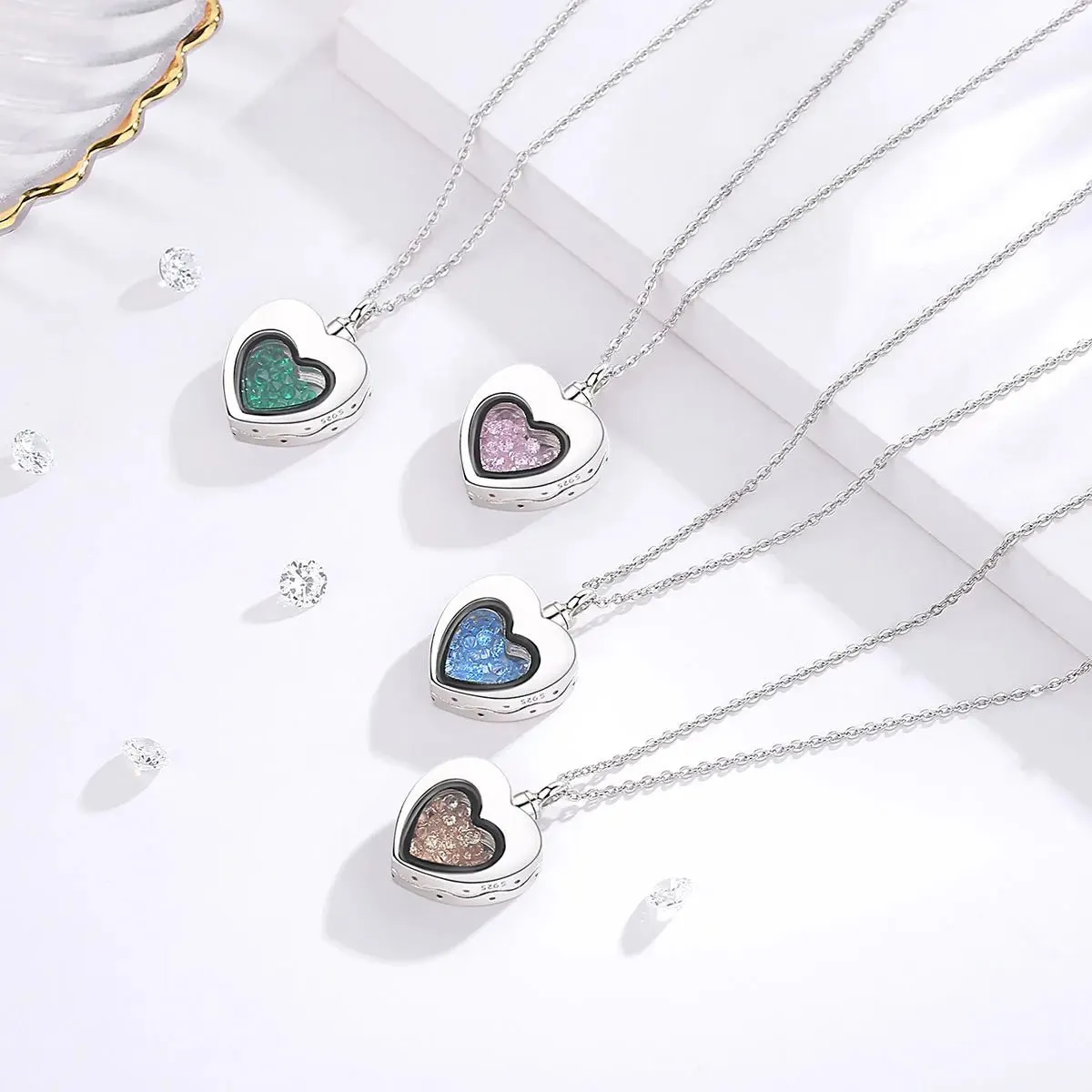 S925 Sterling Silver Heart Urn Locket for cremation ashes. Comes in several Birth Stone crystal colors
