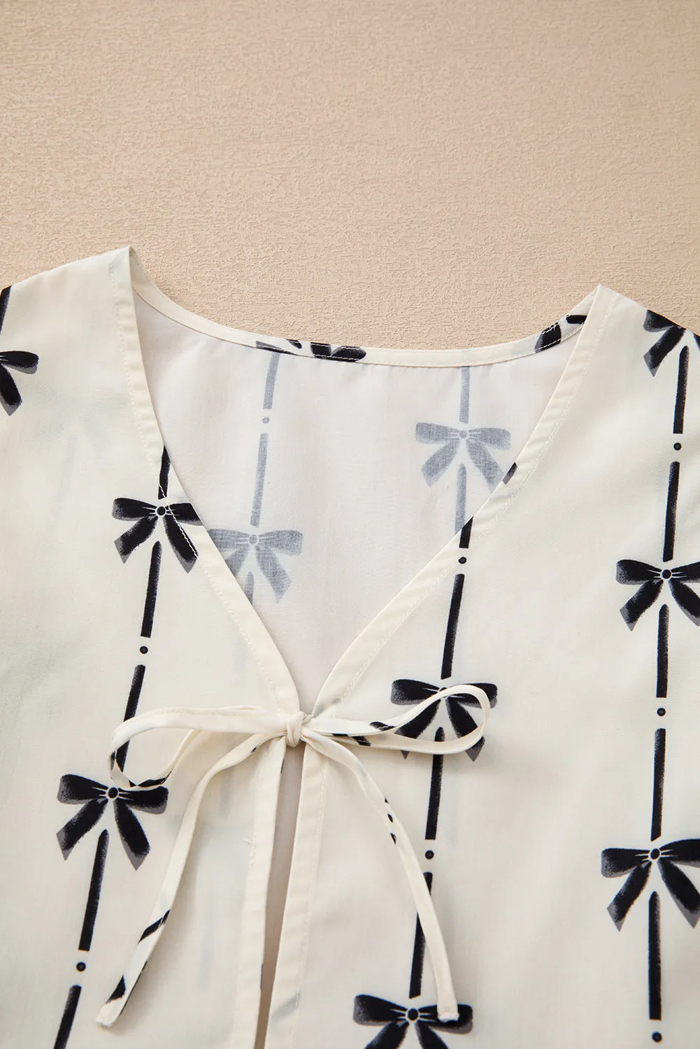 Sweet Bow Print Tie Front Sleeveless Top