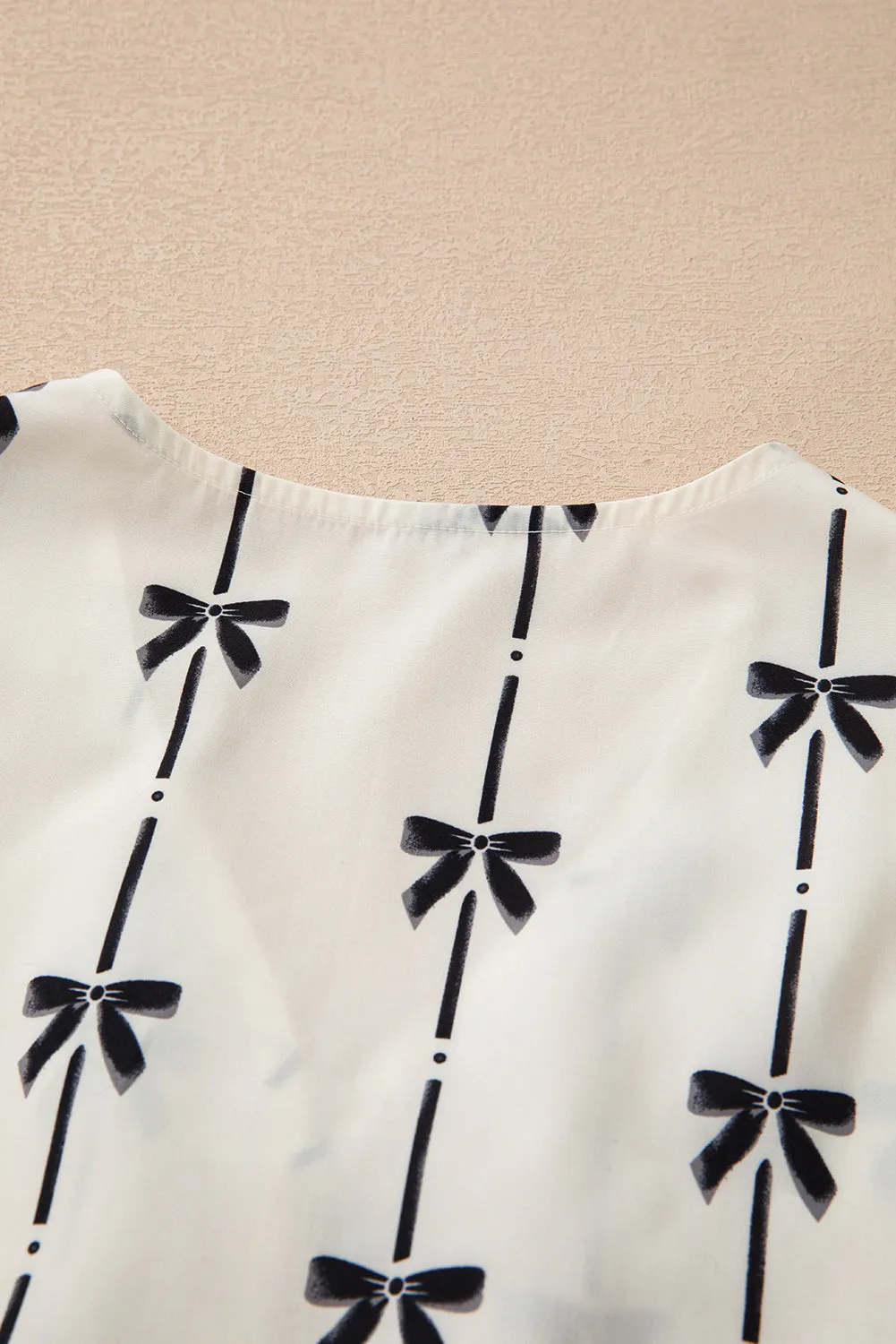 Sweet Bow Print Tie Front Sleeveless Top